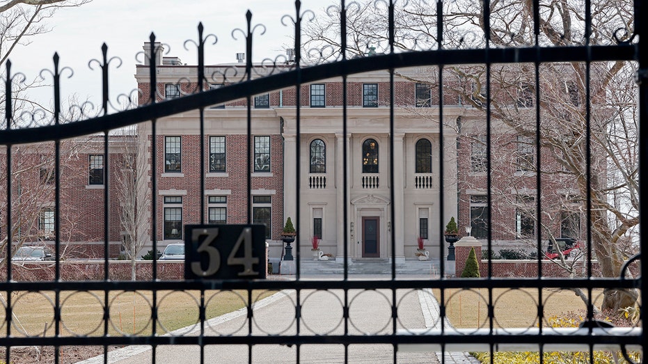 Police hunt armed suspect after housekeeper bound, attacked in luxury mansion heist: report