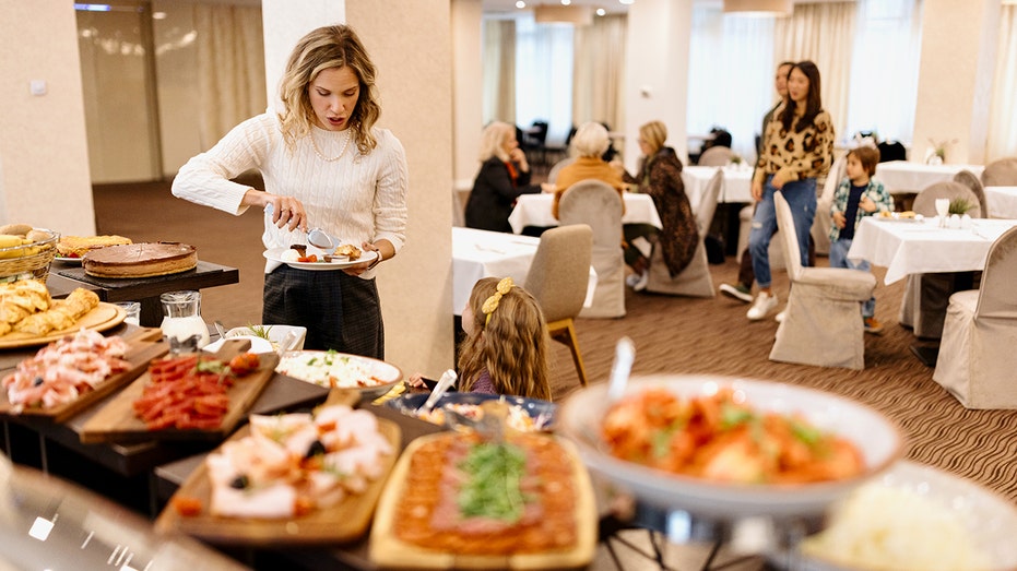 Hotel breakfast bandits caught on video grabbing food, skipping payment