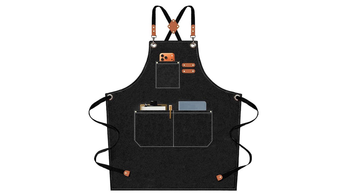 This heavy-duty canvas apron has leather and metal accents.
