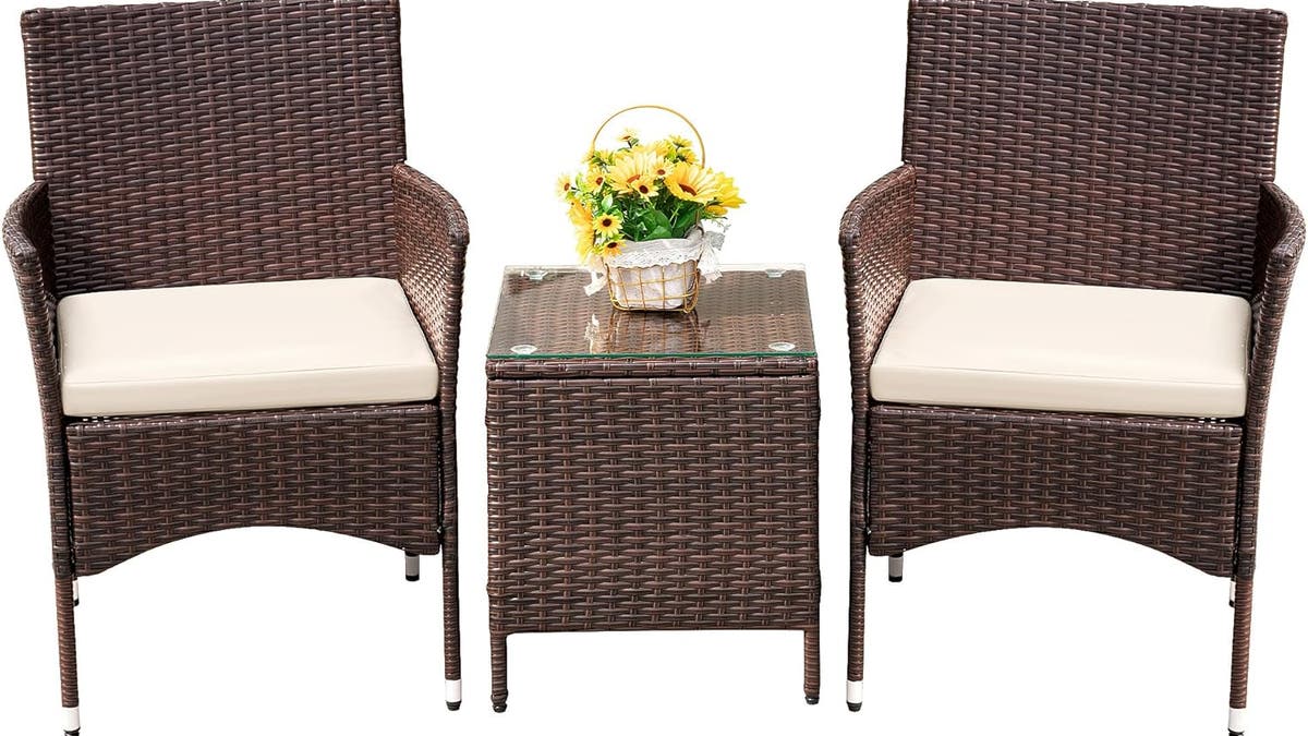 Kick back and relax with this three-piece rattan furniture set.