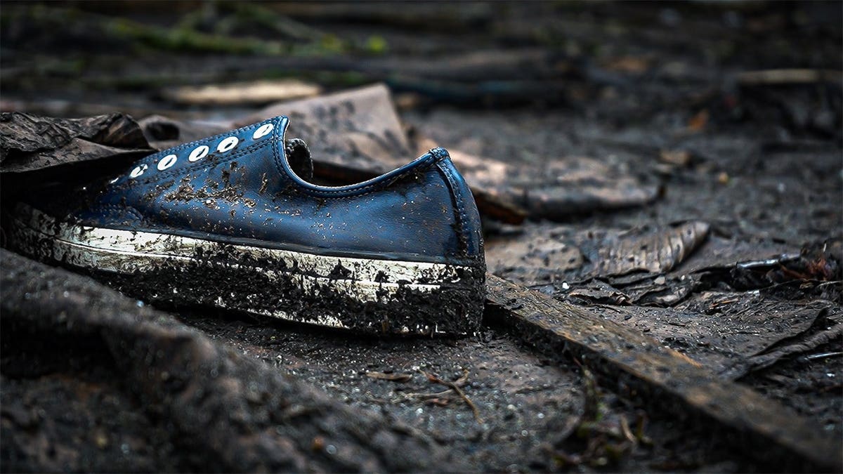 Discarded-shoe-left-at-abandoned-homeless-camp-near-Daejeon-Park