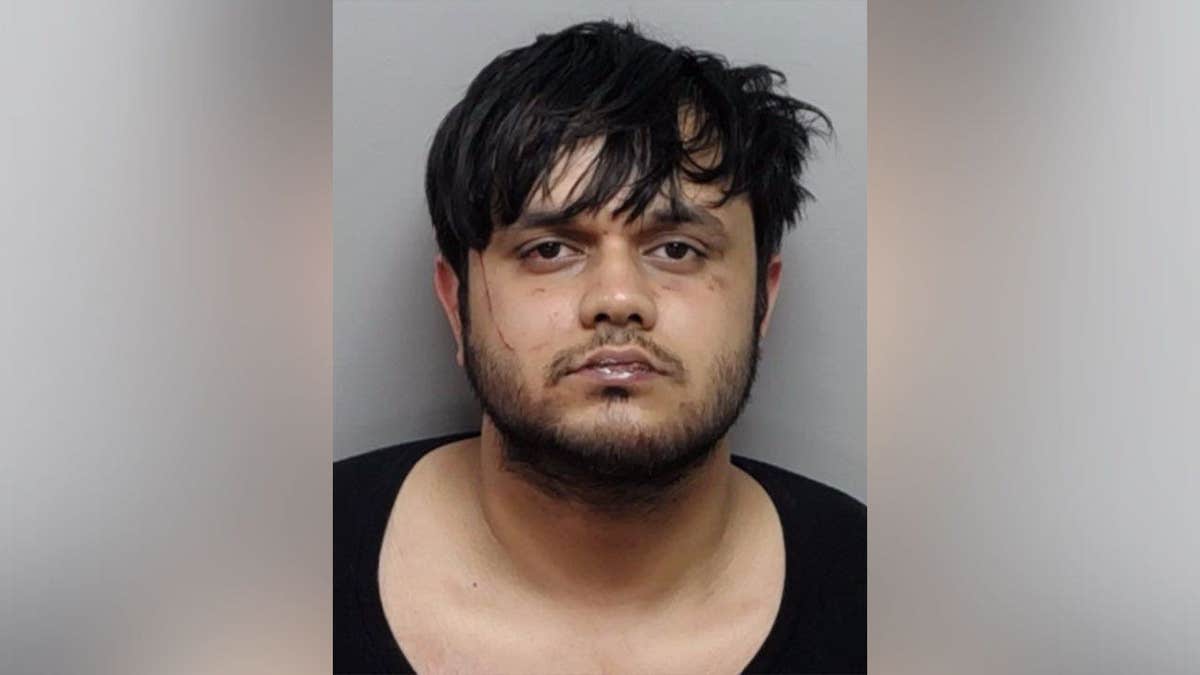 Mugshot of Atharva Vyas against a blurred background