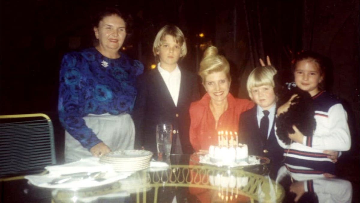 Ivana, eric, don, ivanka, and grandmother at dinner