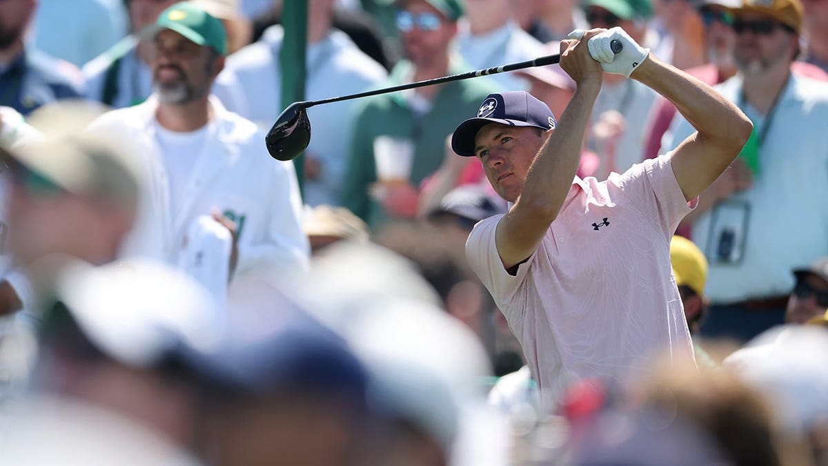 Jordan Spieth playing a golf shot from the eighth tee at Augusta National Golf Club