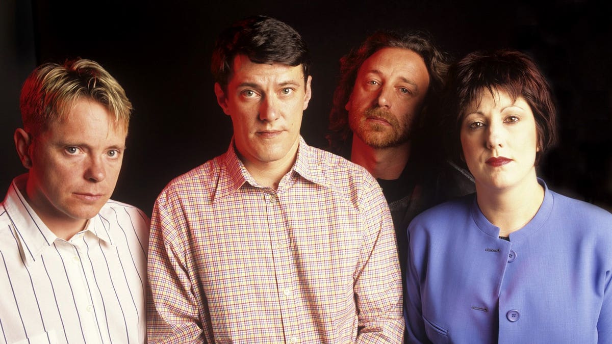 The band members of New Order pose for a portrait in 1989