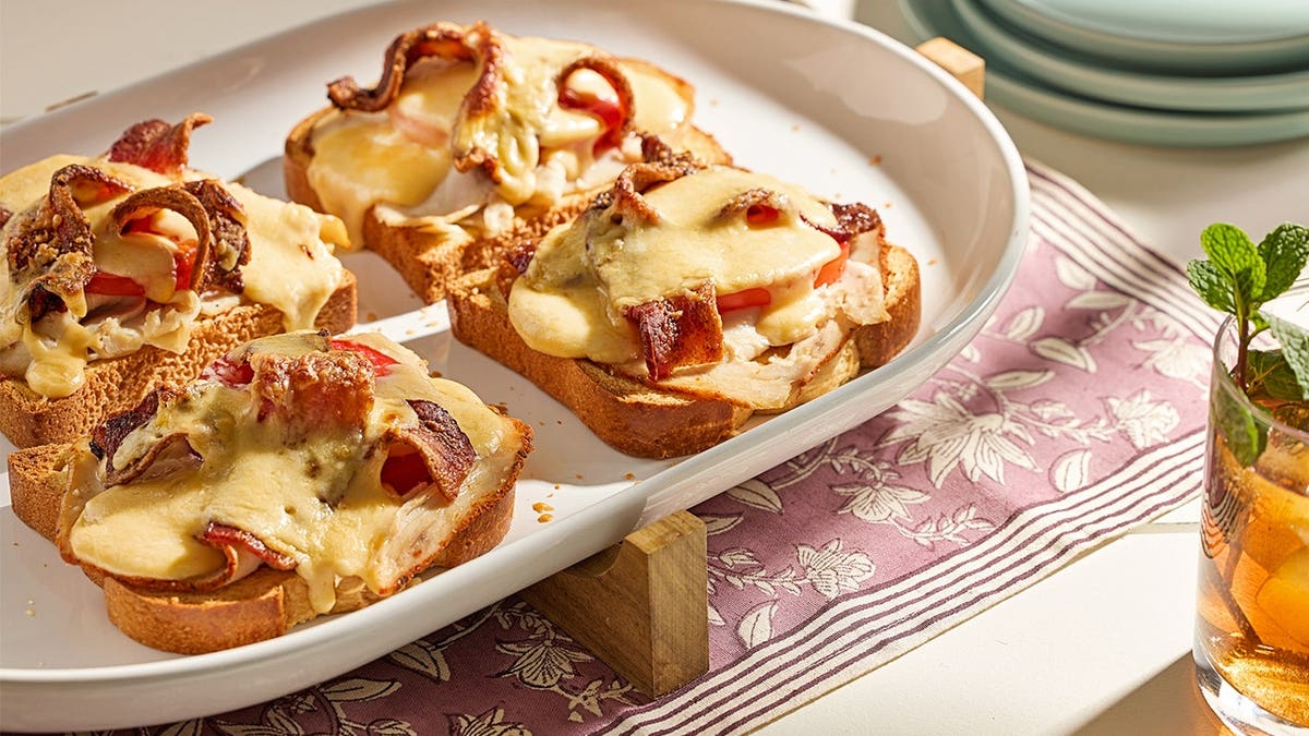 Image of Hot Browns with bacon, cheese sauce