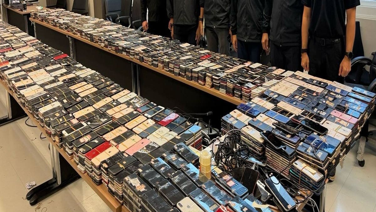 Phones seized from alleged overseas scam center