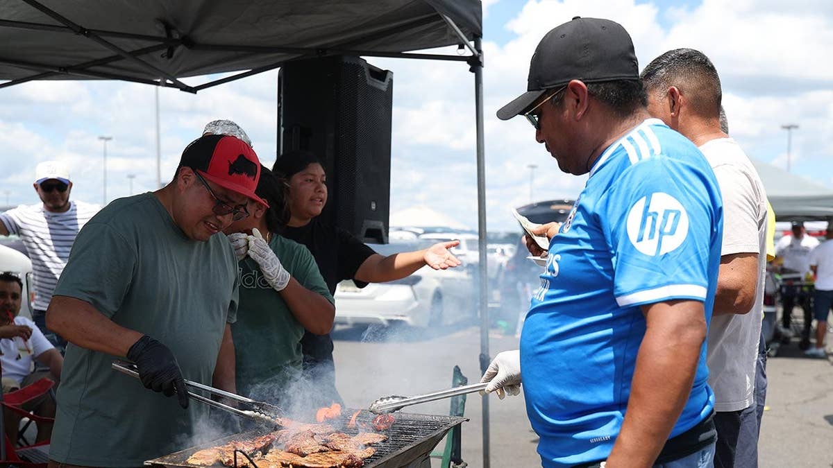 Real Madrid fans tailgating outside MetLife Stadium