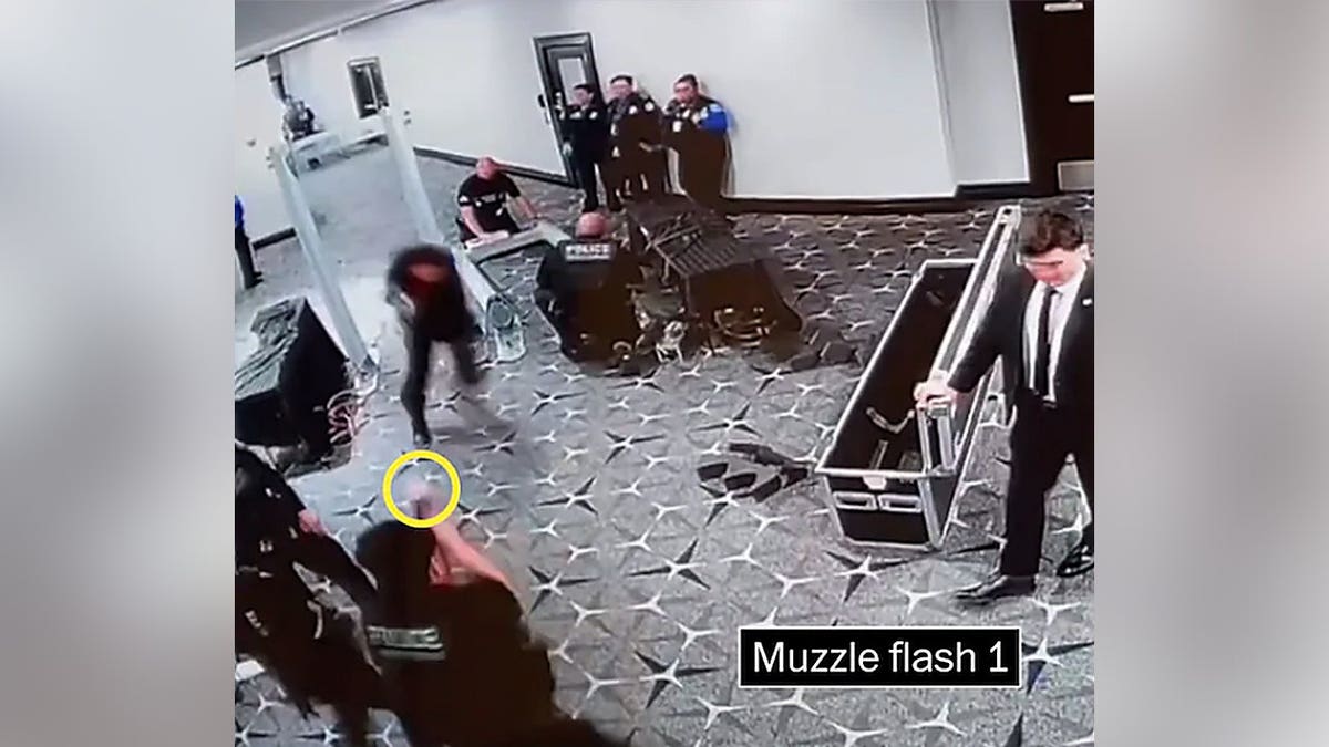 A Secret Service agent fires at Cole Allen