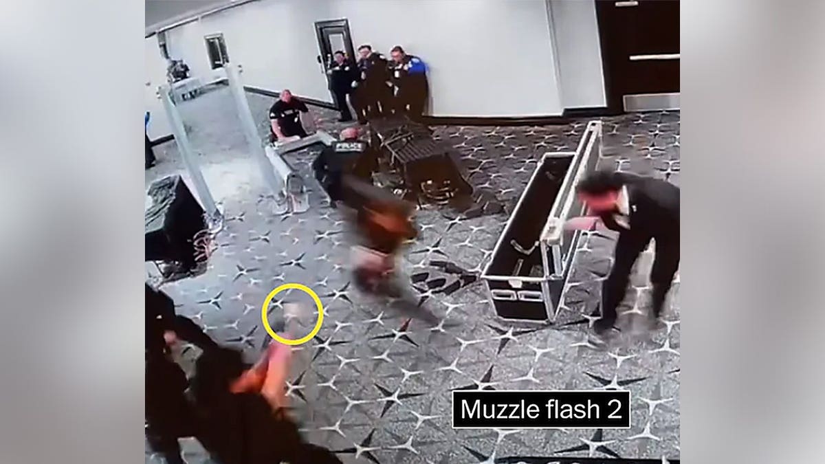 A Secret Service agent fires at Cole Allen