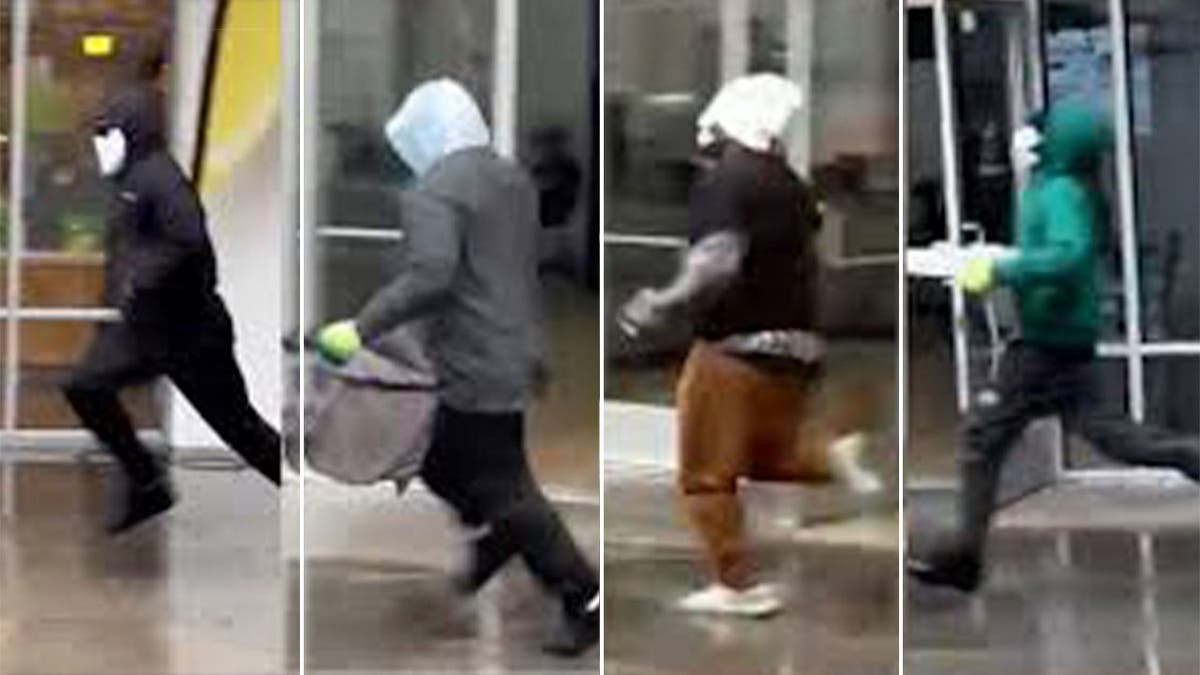 Four masked suspects that were caught on camera