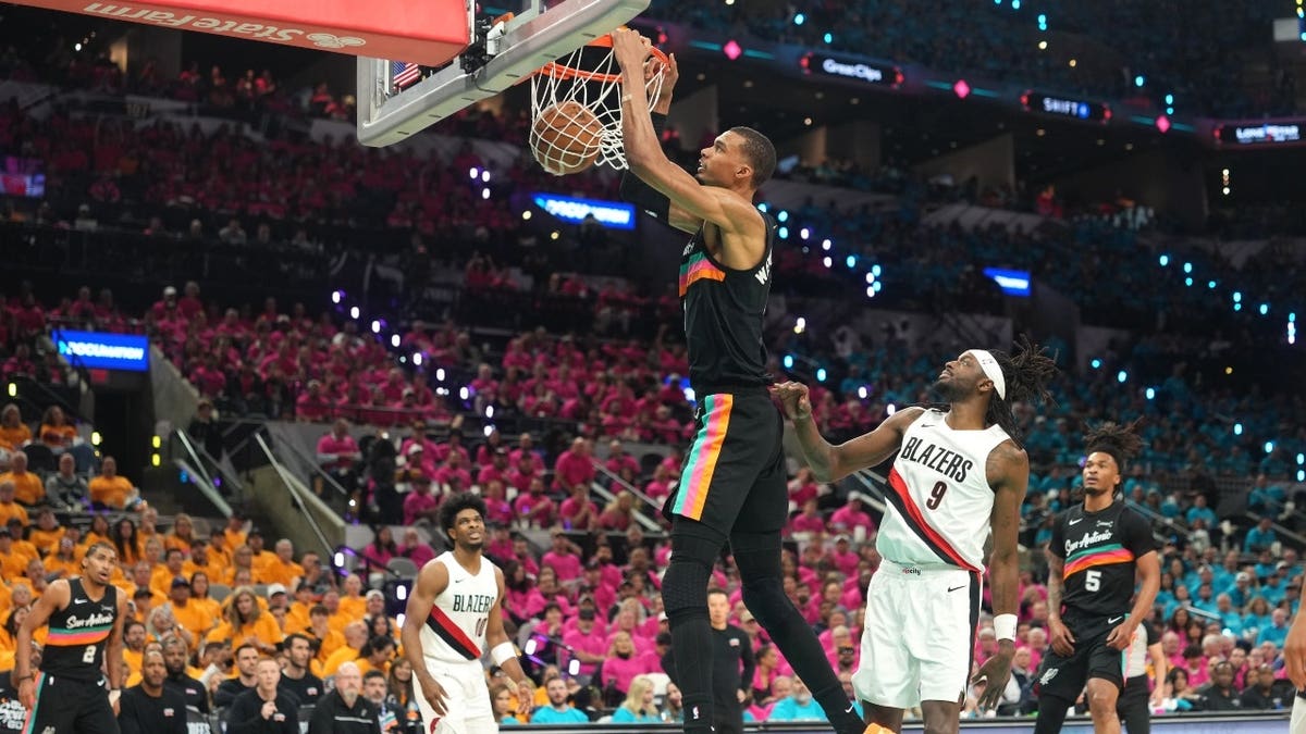 San Antonio Spurs big Victor Wembanyama drives against the Portland Trail Blazers during Game 1 of the first round of the 2026 NBA Playoffs at the Frost Bank Center in Texas.