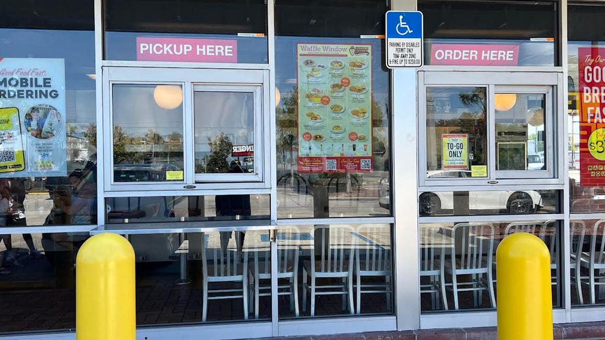 Waffle House sign advertising to-go only at a store in Florida