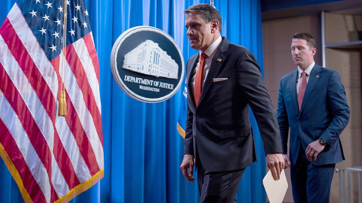 Acting Attorney General Todd Blanche and Assistant Attorney General Colin McDonald leaving Justice Department