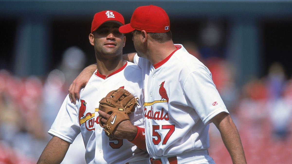 Albert Pujols and Darryl Kile walking on the field at Busch Stadium