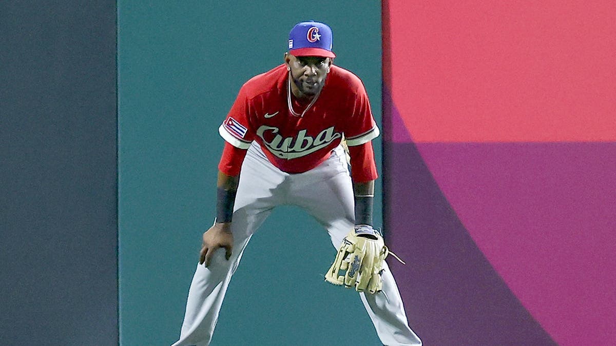 Alexei Ramirez playing left field during a baseball game in San Juan Puerto Rico