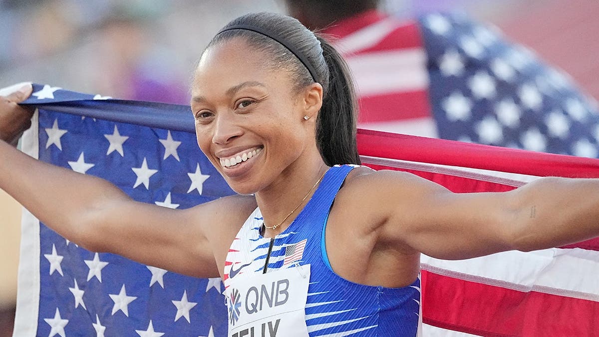 Allyson Felix celebrating after 4x400 meter mixed relay race at World Championships