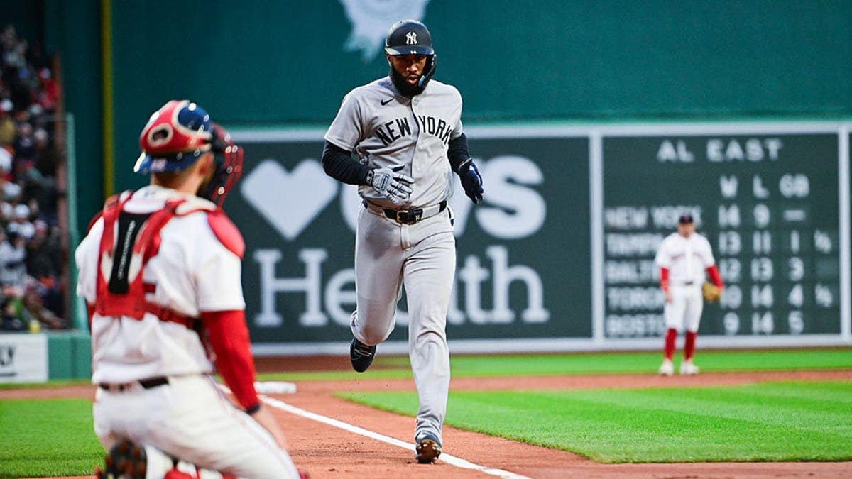 Amed Rosario jogging home after hitting a three-run home run at Fenway Park.