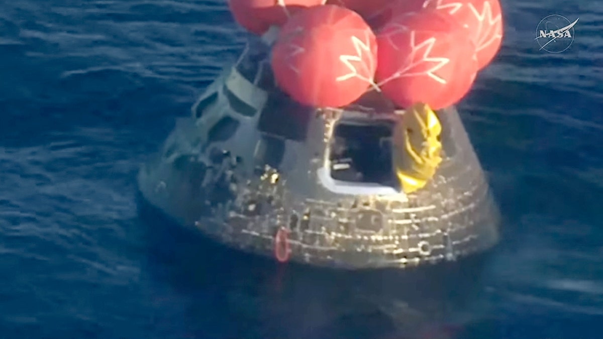 The side hatch of the Orion spacecraft opens, as recovery efforts continue after the Artemis II splashdown on Friday, April 10, 2026 off the coast of San Diego, Calif. (NASA)