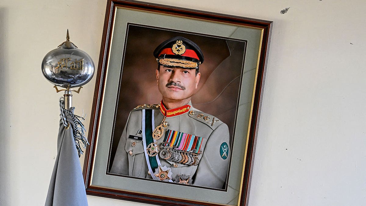 A broken frame of Pakistan's field marshal and army chief, Asim Munir