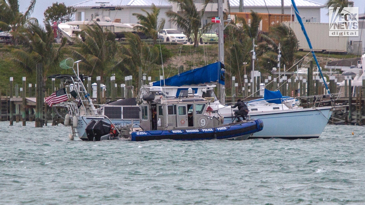private detective private detective Brian Hooker's yacht is searched by Royal Bahamas Police Force in Marsh Harbour