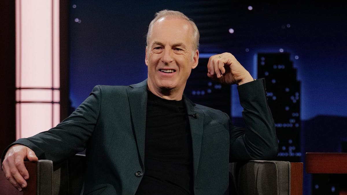Bob Odenkirk seated on Jimmy Kimmel Live talk show set