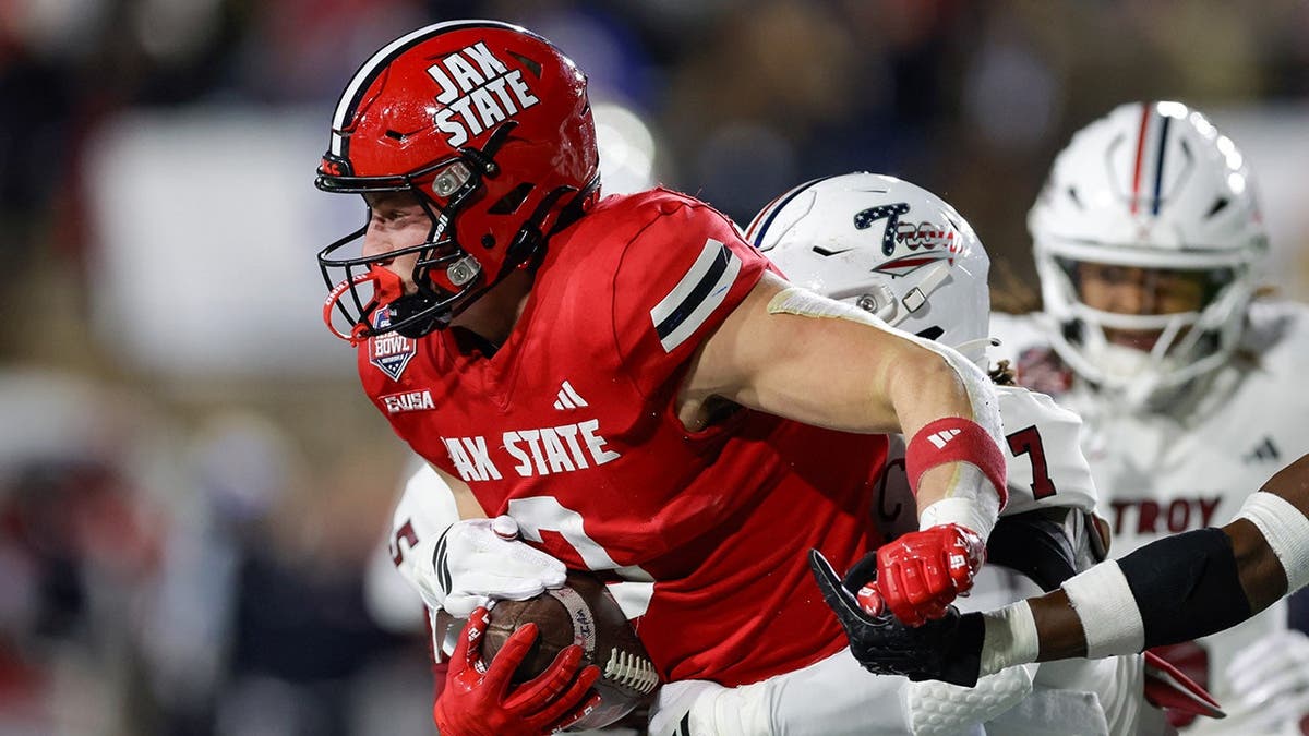 Brock Rechsteiner tackled by Jordan Stringer during shot   crippled  successful  Montgomery Alabama