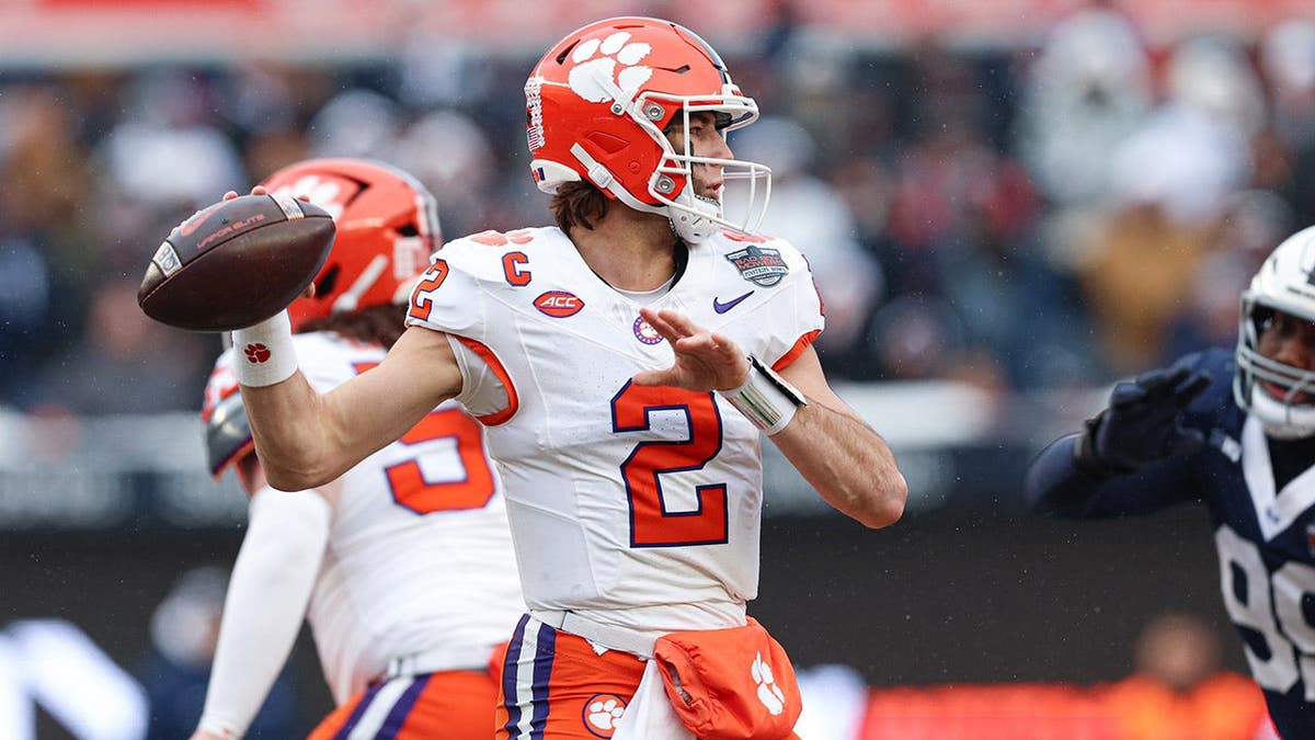 Clemson Tigers quarterback Cade Klubnik throwing a football at Yankee Stadium