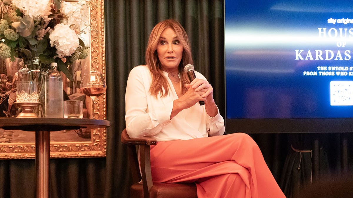 Caitlyn Jenner standing at a drinks event in London