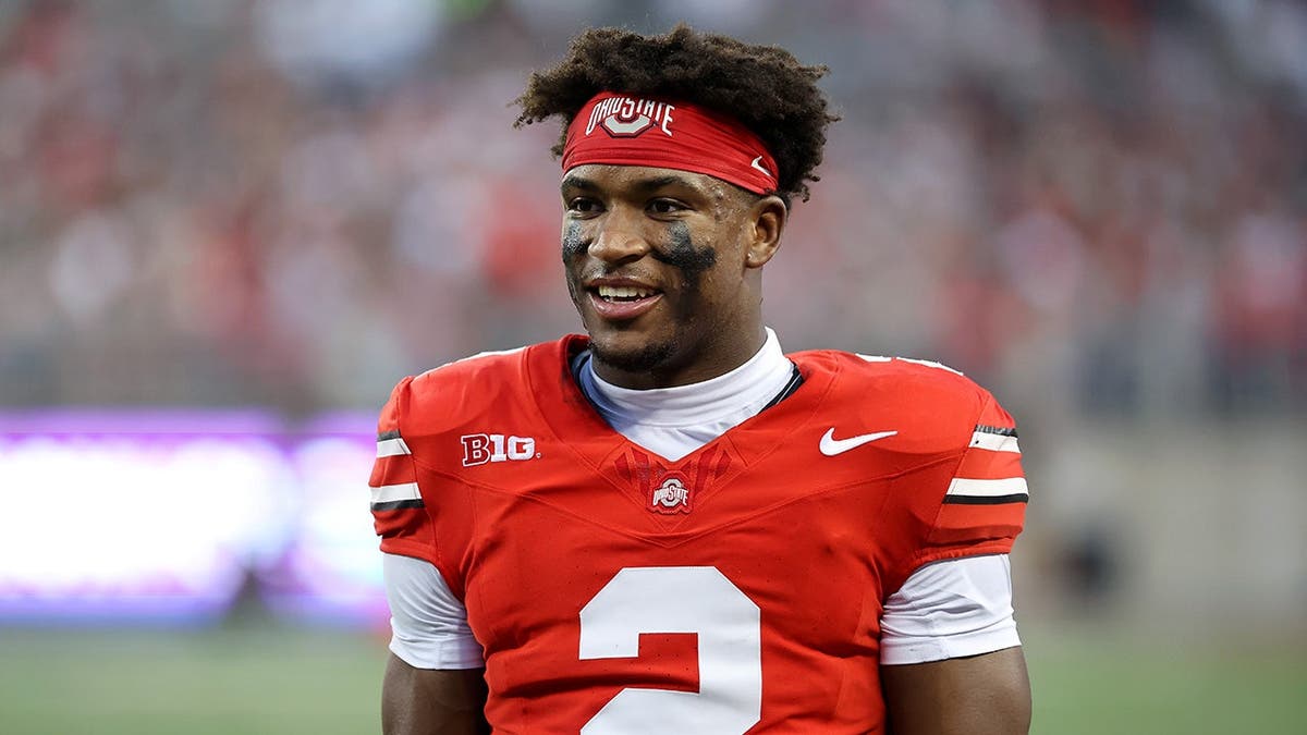Ohio State Buckeyes safety Caleb Downs reacting during a football game at Ohio Stadium