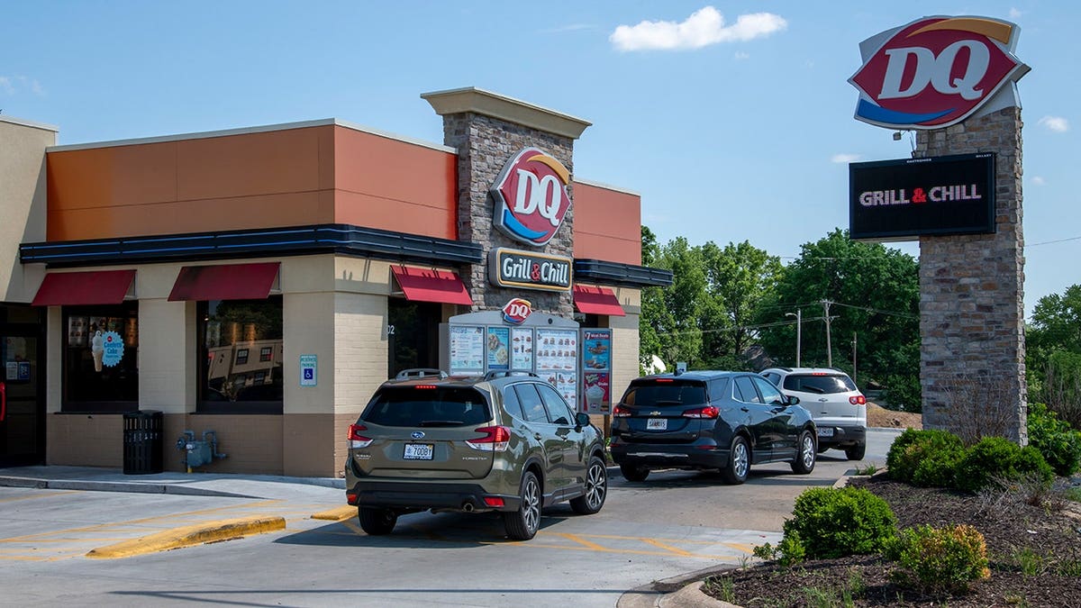 Cars lined up in the drive-thru lane at a Dairy Queen in Lansing, Kansas