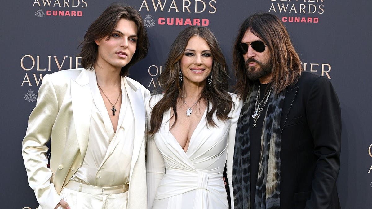 Damian Hurley, Elizabeth Hurley, Billy Ray Cyrus at the Olivier Awards in London in April 2026.