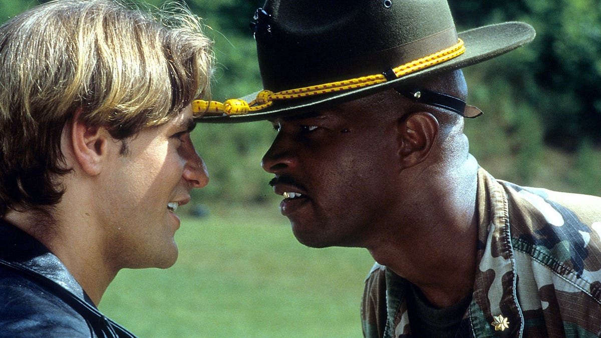 Damon Wayans looking eye to eye with a cadet in a scene from Major Payne