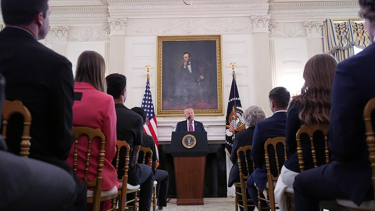 President Donald Trump speaks in the State Dining Room of the White House