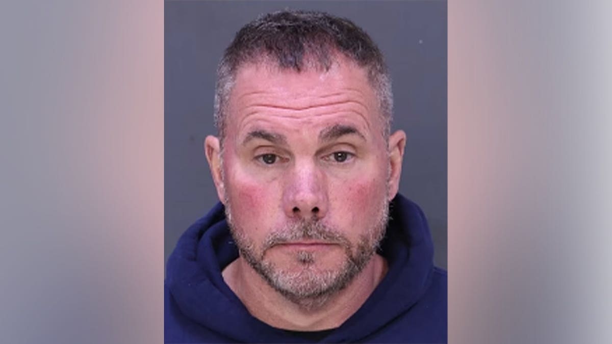 Dwight DJ Rust Jr. standing in custody in Baltimore County Maryland