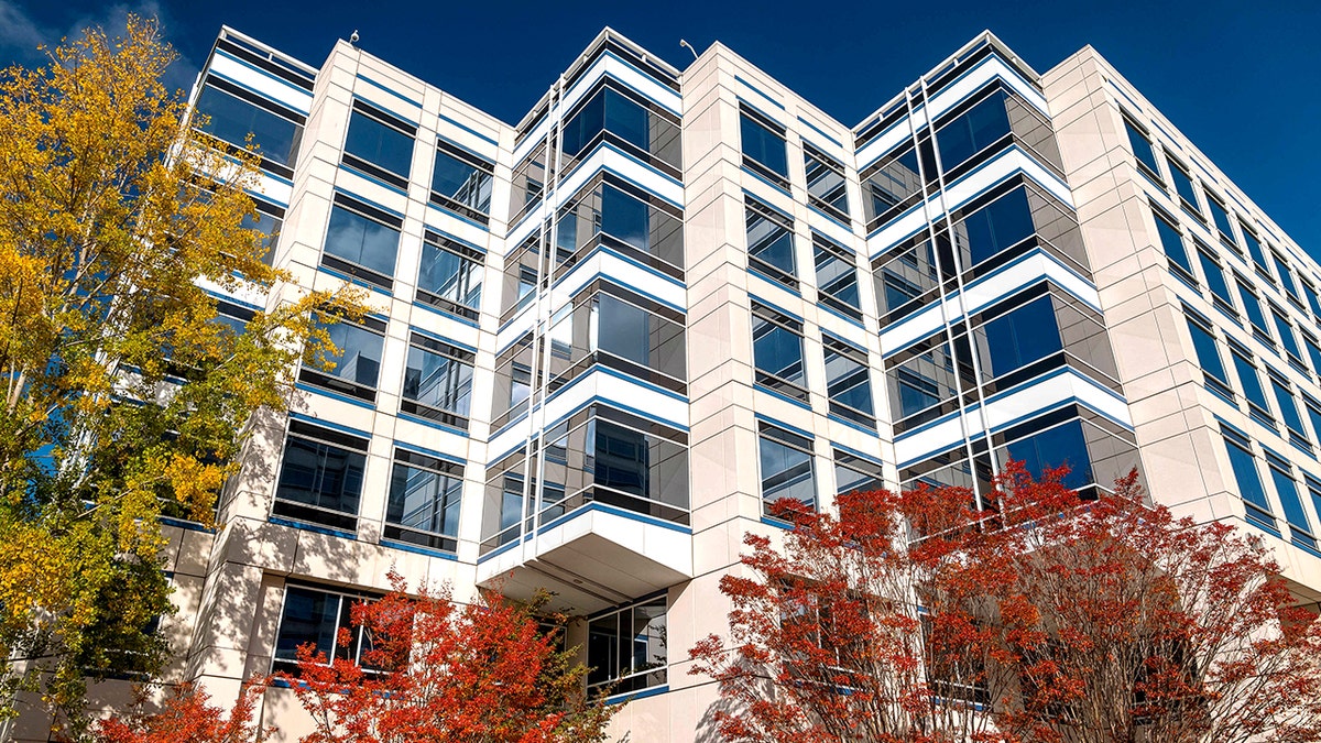 The exterior of an office building is shown.