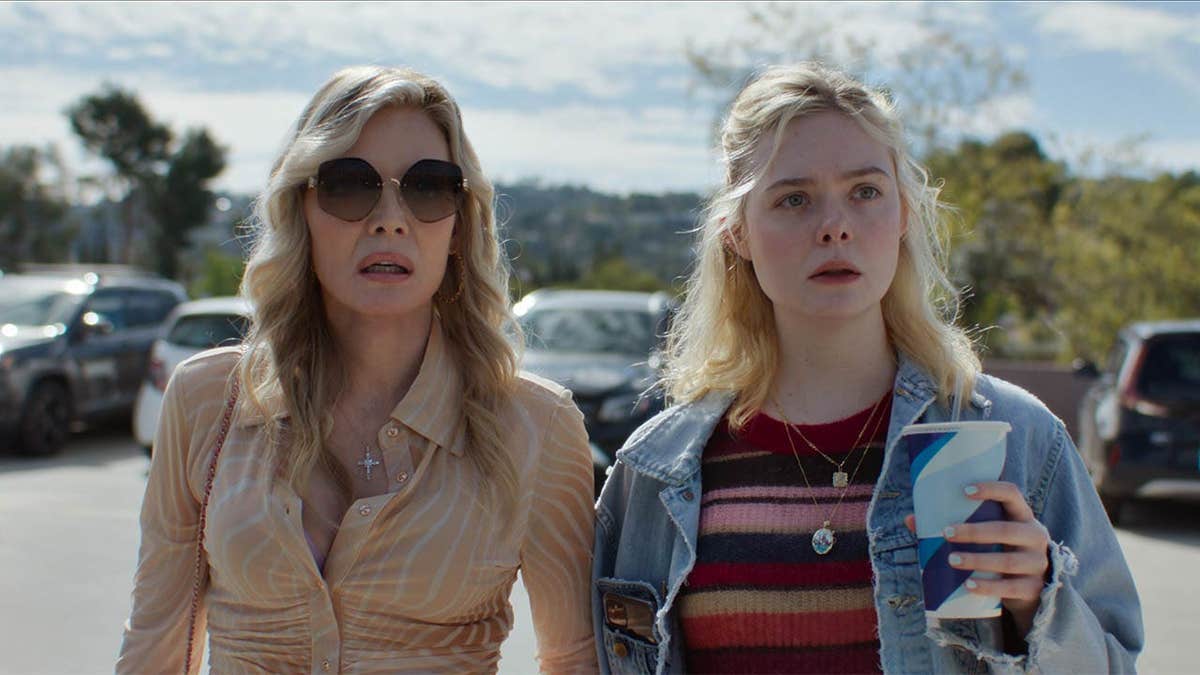 Michelle Pfeiffer standing next to Elle Fanning in Margo's Got Money Troubles
