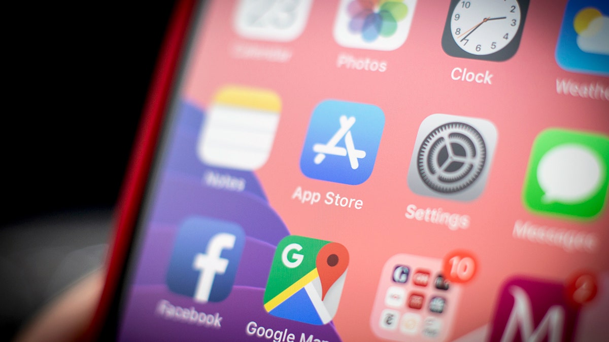 The Apple App Store is shown on an iPhone home screen.