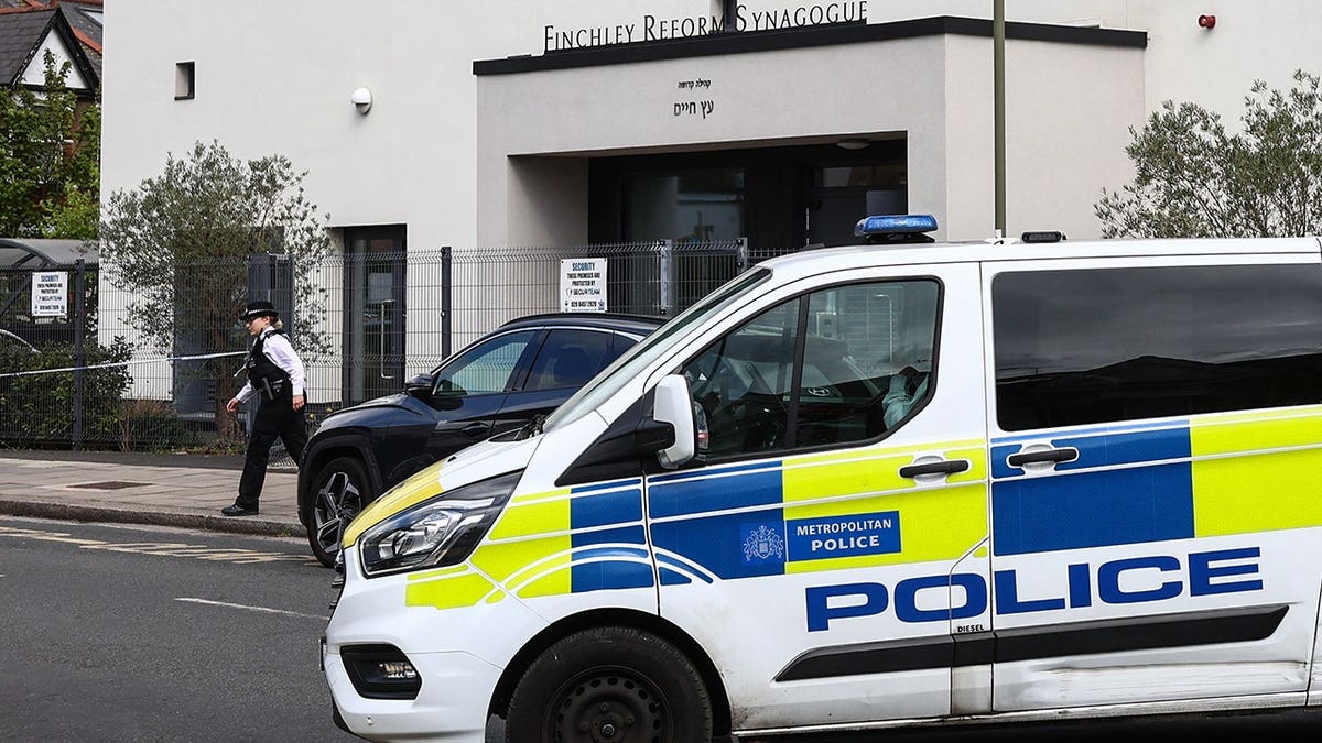 A police officer investigating outside Finchley Reform Synagogue in north London