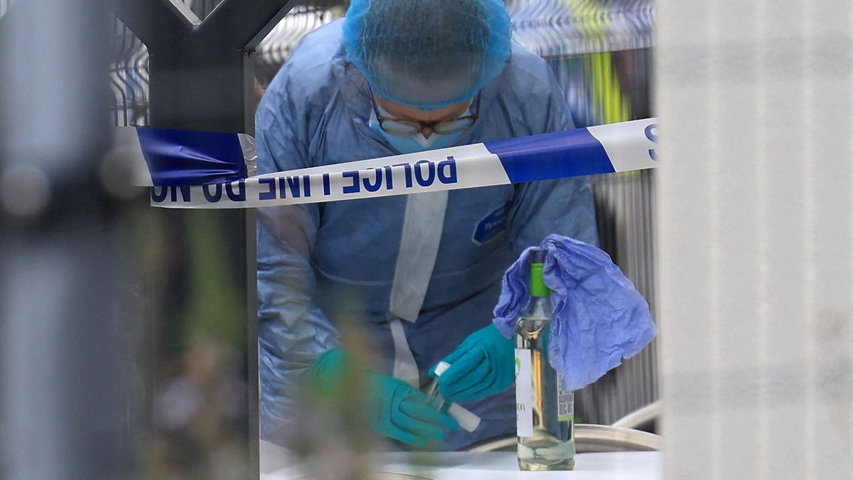 Police forensics officer working at Finchley Reform Synagogue in north London