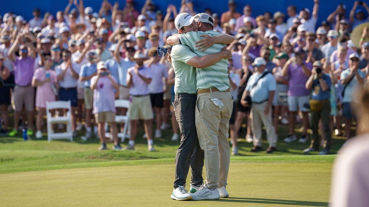 alex and matt fitzpatrick celebrate together