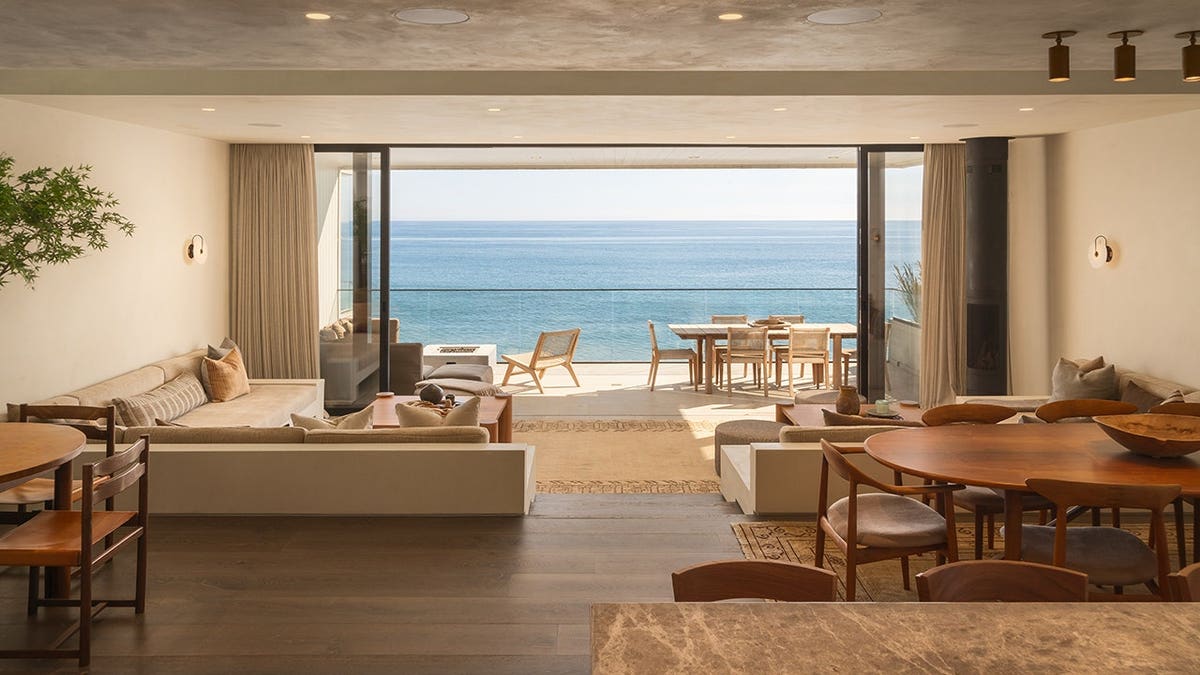 A living room with an ocean view.