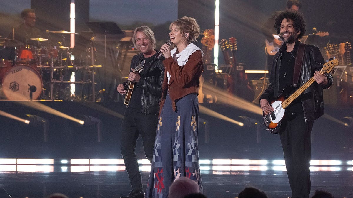 Hannah Harper singing on stage during American Idol performance