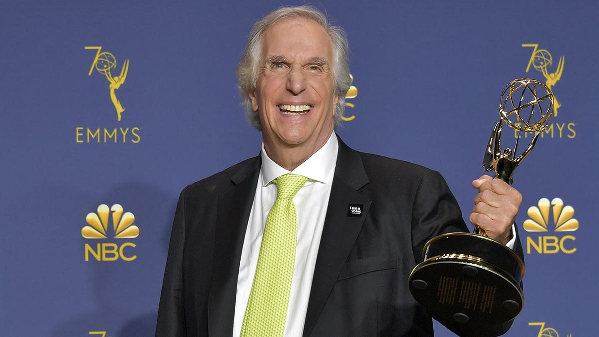 Henry Winkler holding his Emmy at the award show in September 2018 in Los Angeles