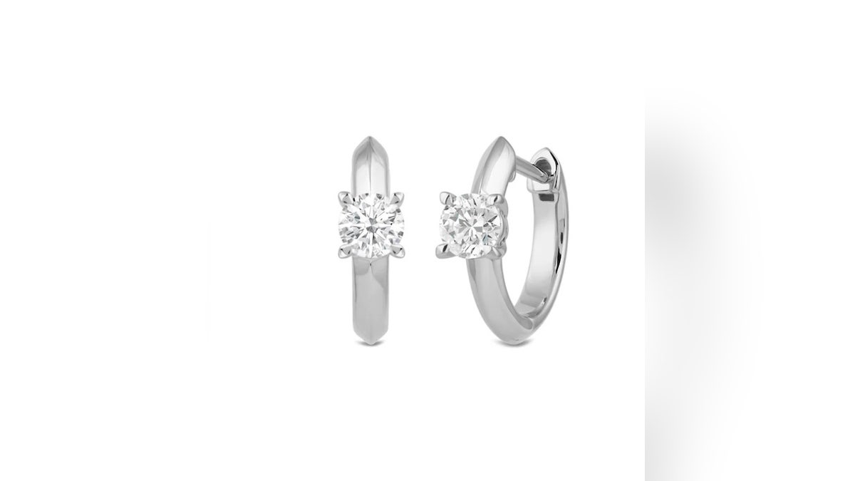 These earrings combine studs and hoops.