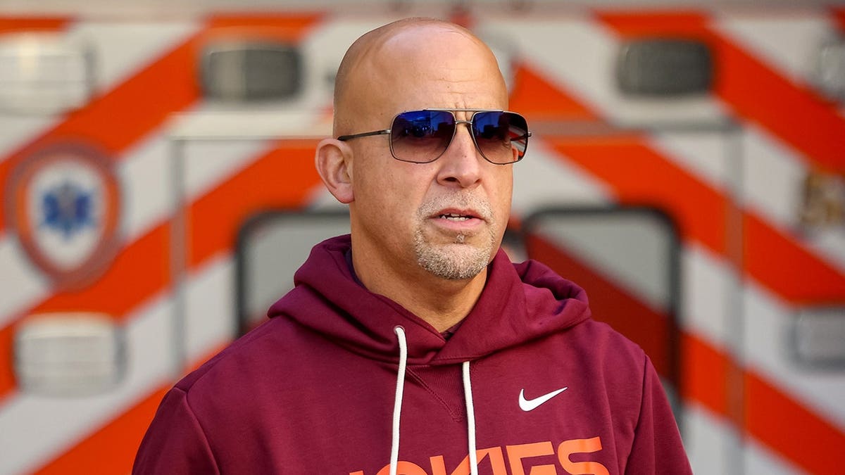 Head coach James Franklin walking on the field at Lane Stadium in Blacksburg, Virginia