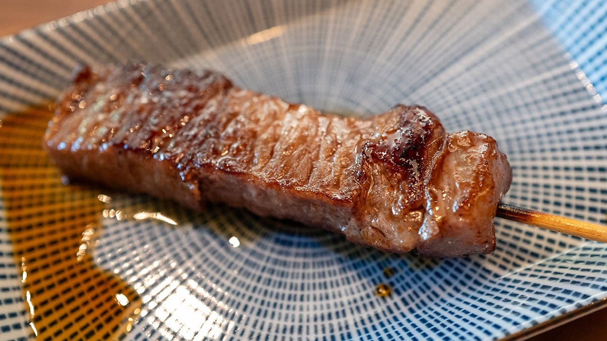 Close-up of a skewer with Japanese A5 Wagyu beef