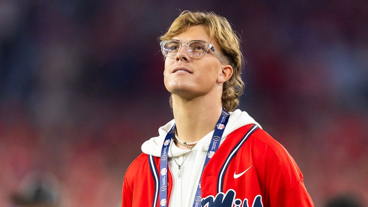 Mississippi Rebels former quarterback Jaxson Dart standing at State Farm Stadium.
