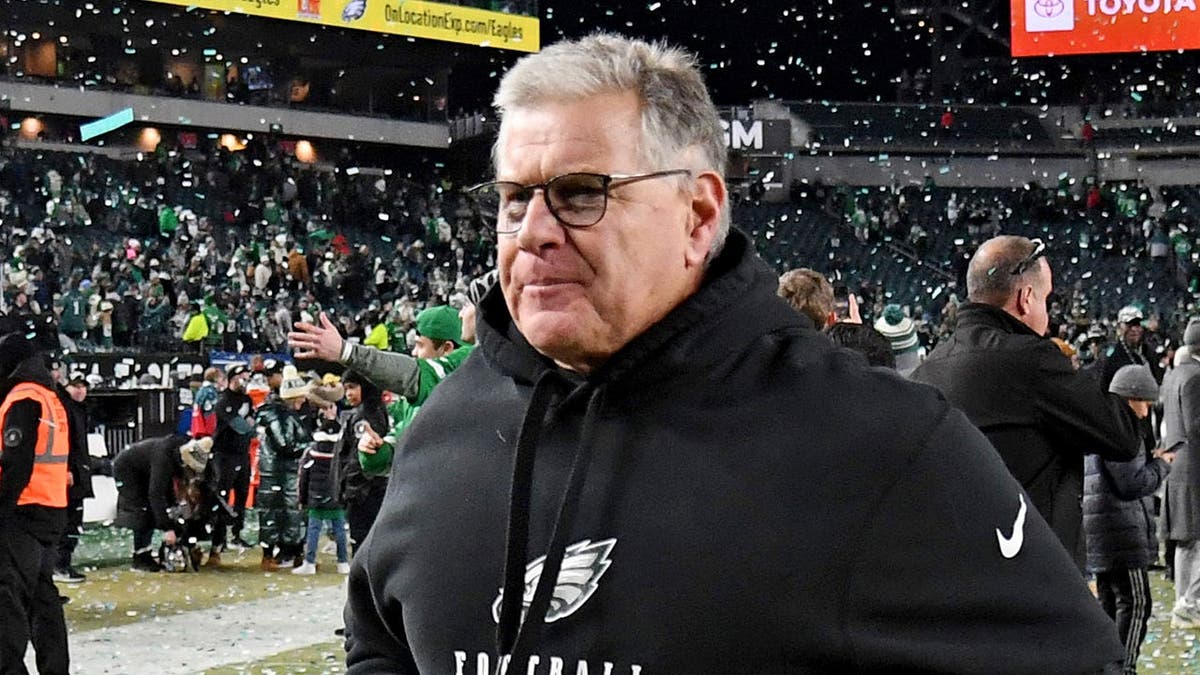 Jeff Stoutland running off the field at Lincoln Financial Field
