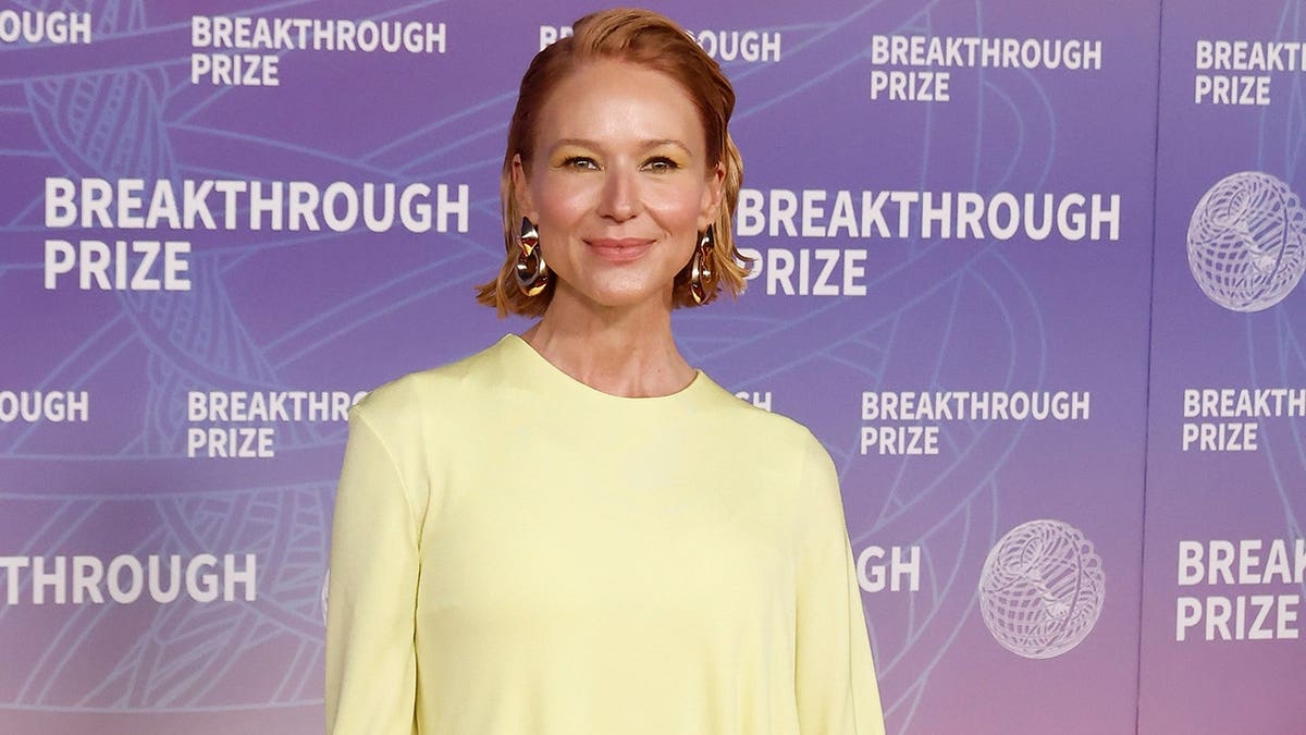 Jewel in a yellow dress at the Breakthrough Awards in Los Angeles in April 2026.